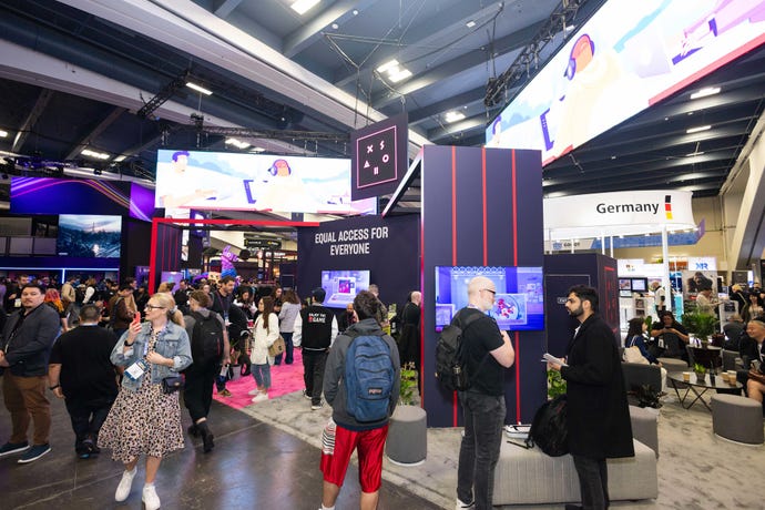 A picture of the show floor at GDC 2024, with people standing aroud booths