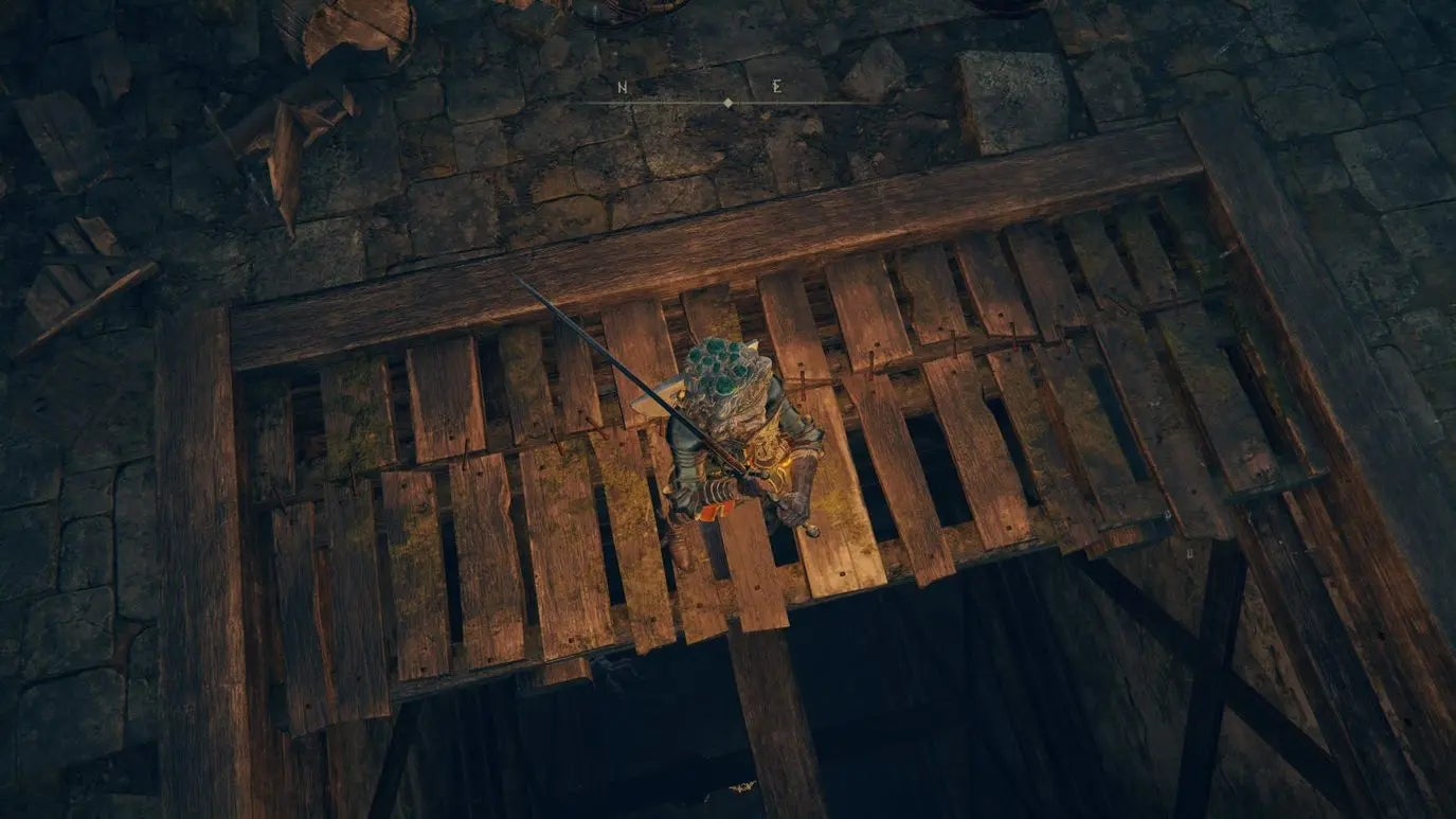 A warrior stands on a wooden walkway in Castle Morne in Elden Ring.