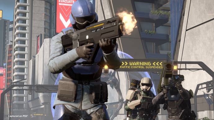 A Helldivers 2 NPC worker warring amid the skyscrapers of Super Earth, with different soldiers disposable behind