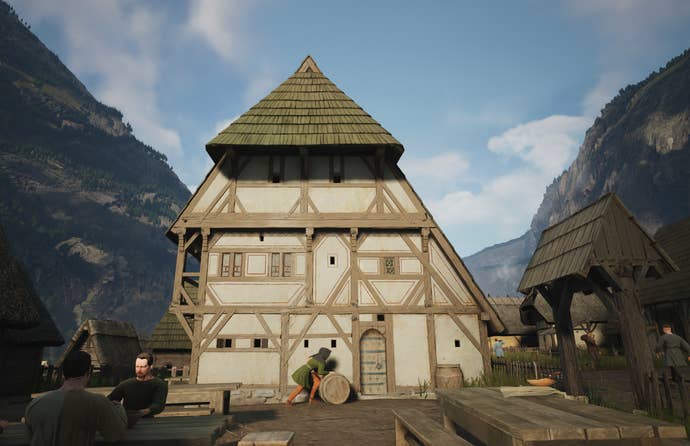 A picture of a tall peaked house in Manor Lords