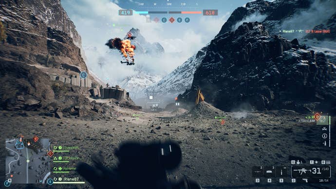 A screenshot of Battlefield 6, showing the player running through a snowy valley. In the sky above, a helicopter falls to Earth after being shot down by a jet flying overhead.