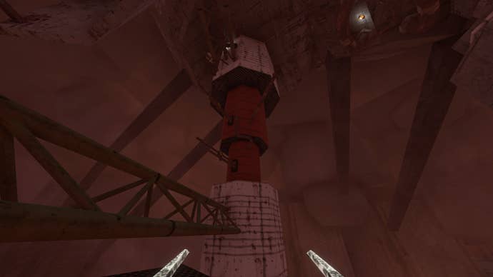 An underground tower with girders in Lorn’s Lure, seen through a pinkish gloom