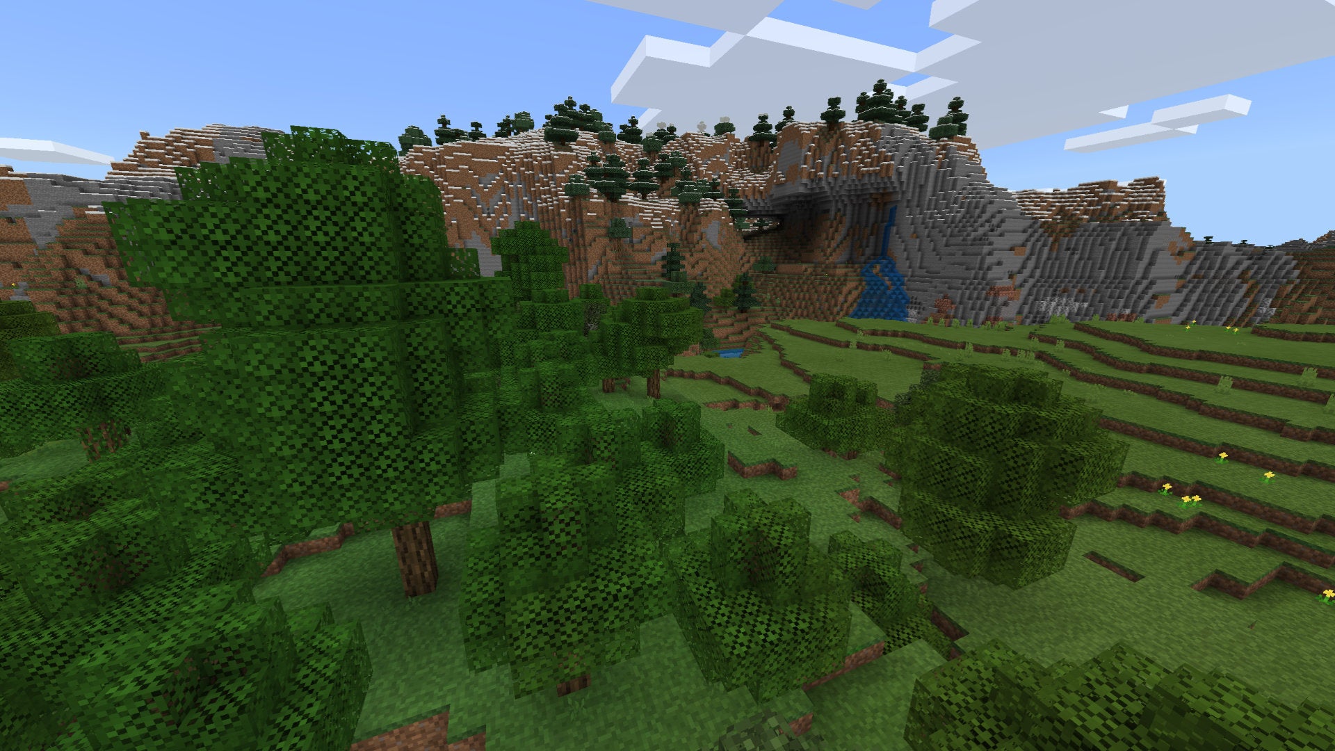 A Minecraft Bedrock screenshot of a landscape displayed using the 8-BitCraft Texture Pack. - 10
