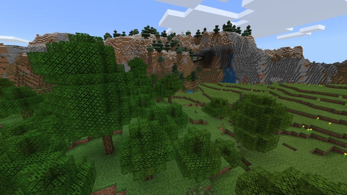 A Minecraft Bedrock screenshot of a landscape displayed using the 8-BitCraft Texture Pack.
