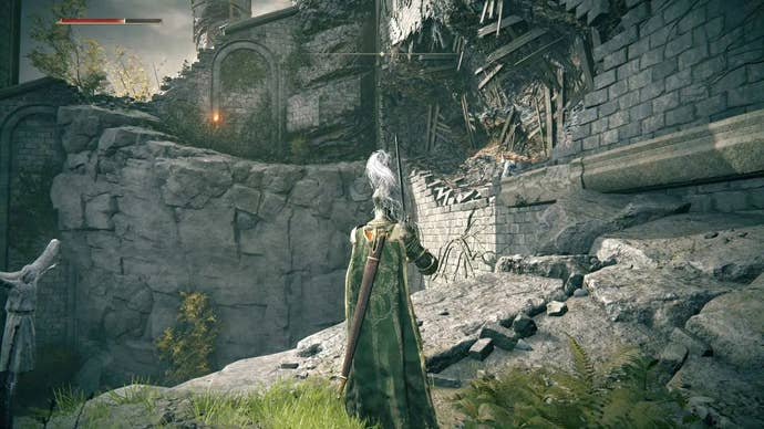 A knight looks out over a side passage around the outside of Stormveil Castle in Elden Ring.