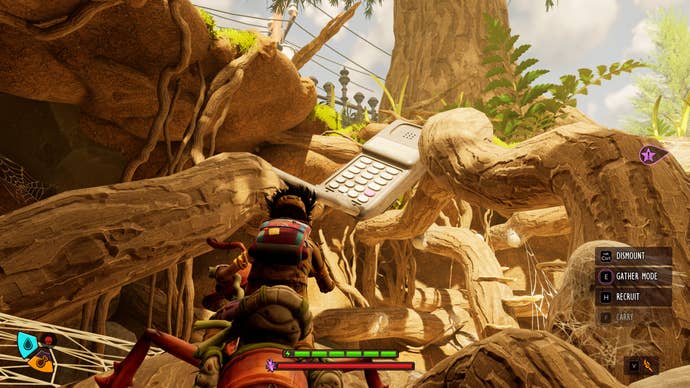 A character on ant-back navigates a twisted pile of tree roots that houses an old-school mobile phone. It's huge! They were large but not this large. It's large because we're small.