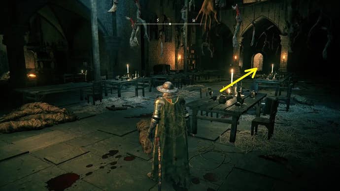 A knight stands in a banquet room inside Stormveil Castle in Elden Ring, with a yellow arrow pointing to a passageway off to the right.