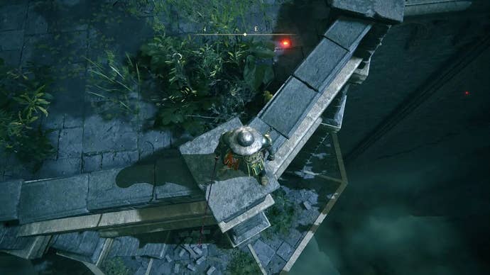 A knight stands on top of Stormveil Castle’s Rampart Tower in Elden Ring and looks down.