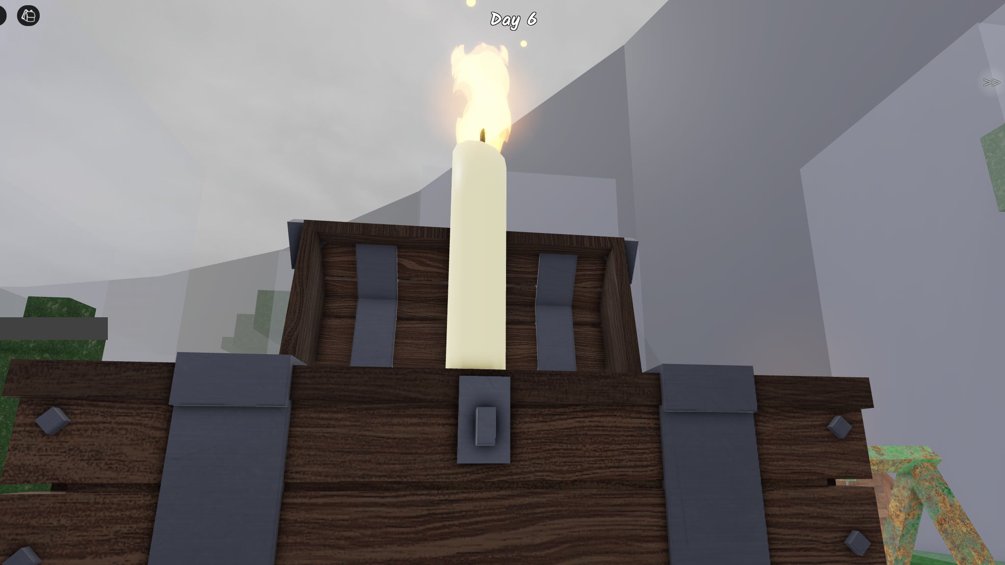 A Halloween Candle inside a chest in 99 Nights in the Forest. - 3