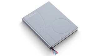 Close up of grey PlayStation anniversary hardback book