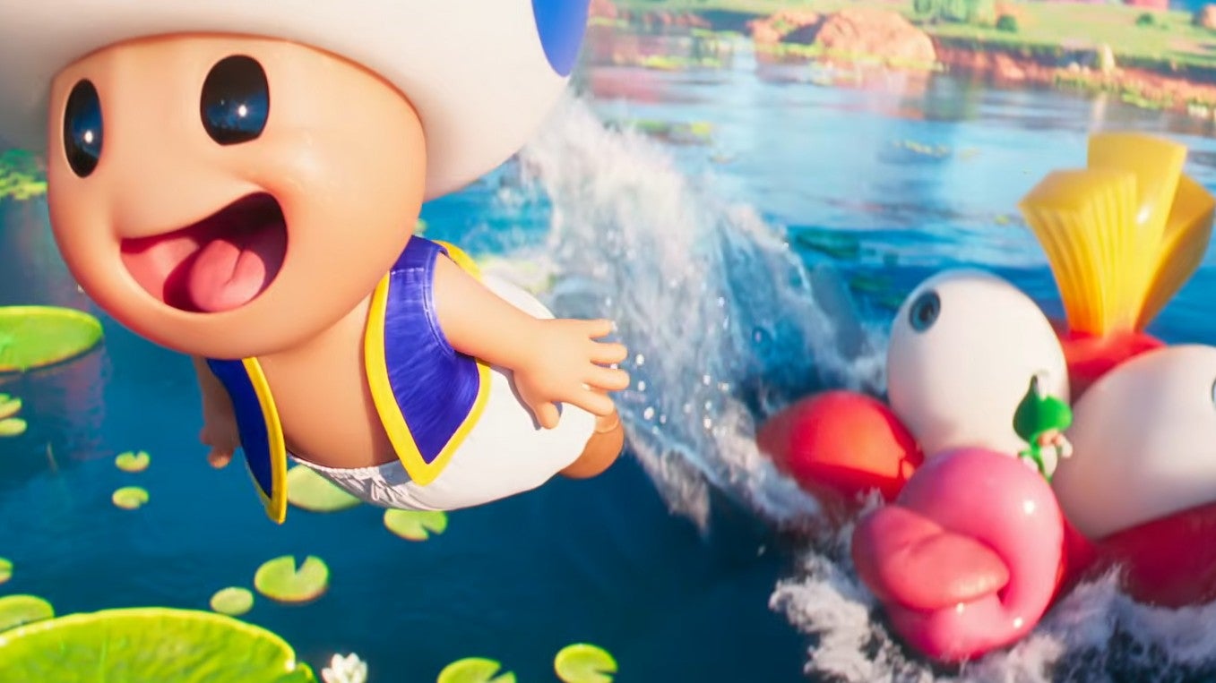 A blue headed Toad shoots from the mouth of a giant fish in The Super Mario Galaxy Movie trailer still