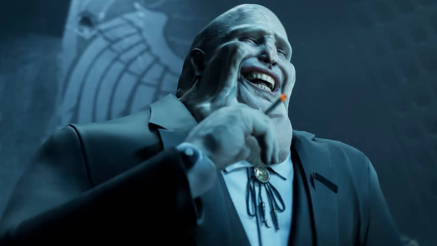 A large male character with a bald head and large sagging chin smoking a cigarette while laughing in Hell is Us