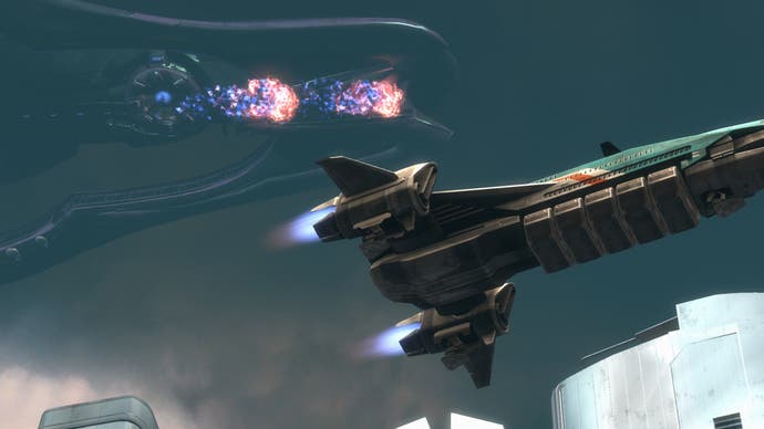 A spacecraft races past a huge Covenant ship in Halo: Reach