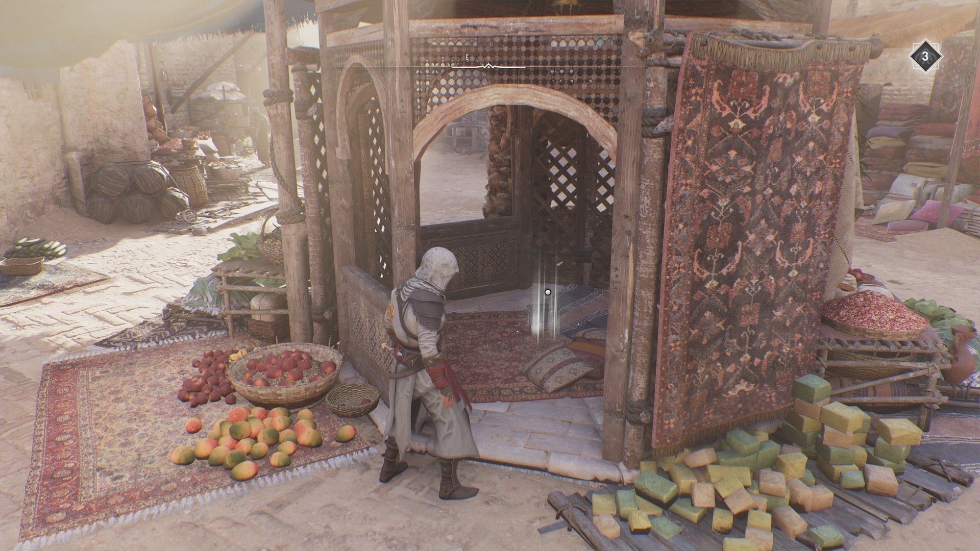 Basim looks inside a small gazebo with a treasure inside of it in Assassin&rsquo;s Creed Mirage