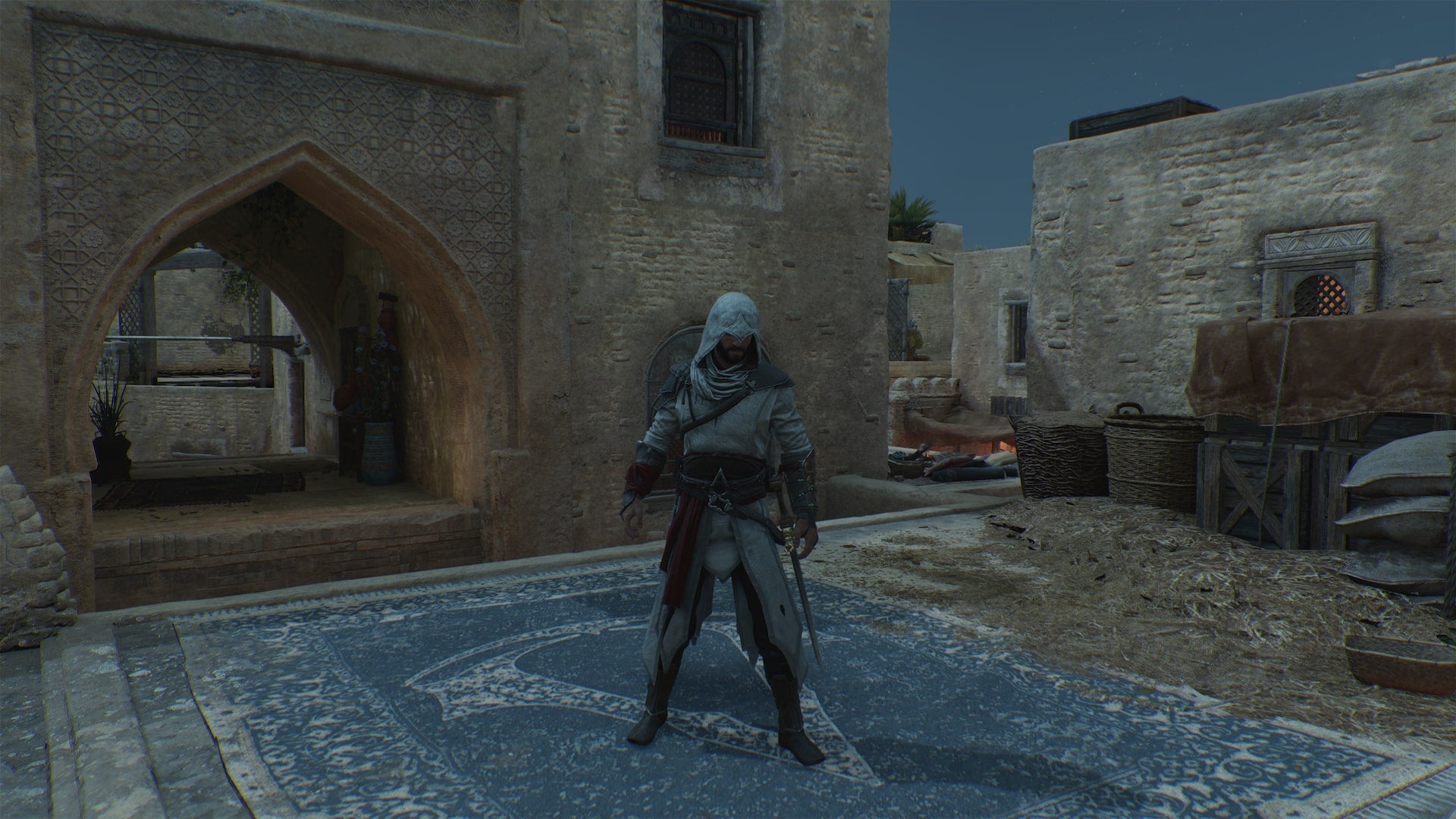 Basim stands atop a rooftop in Assassin&rsquo;s Creed Mirage