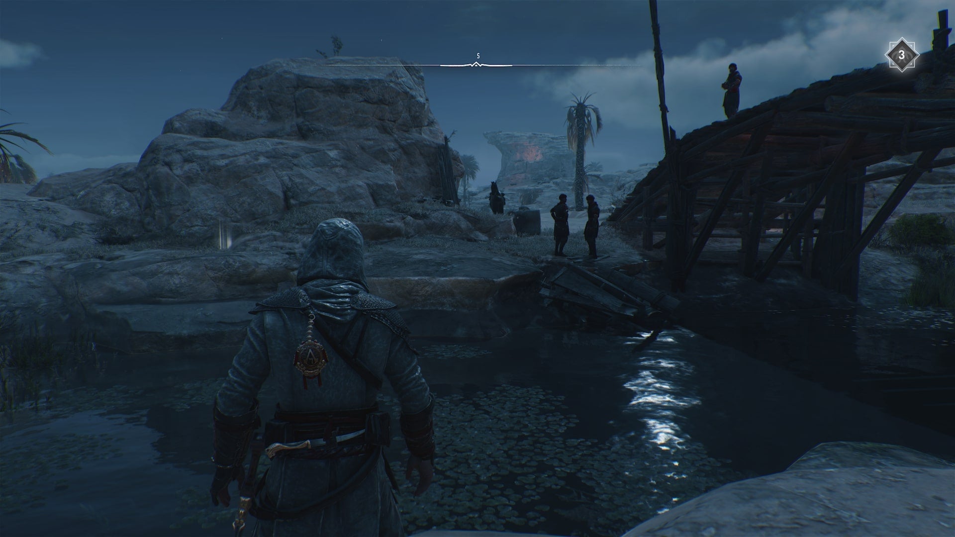 Basim looks across a river at some guards and a treasure in the Wilderness of Assassin&rsquo;s Creed Mirage