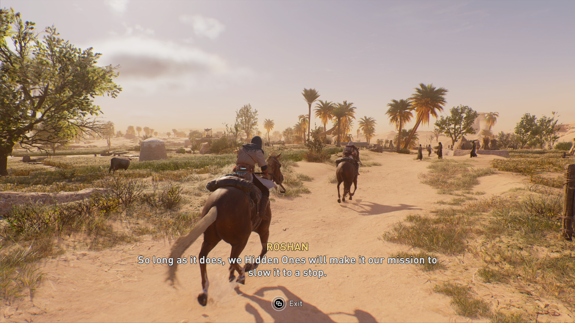Basim and Roshan ride horses through a desert in Assassin&rsquo;s Creed Mirage
