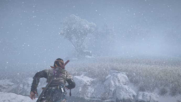 AC Shadows screenshot showing Naoe running through snowy wheat fields with a single distant tree