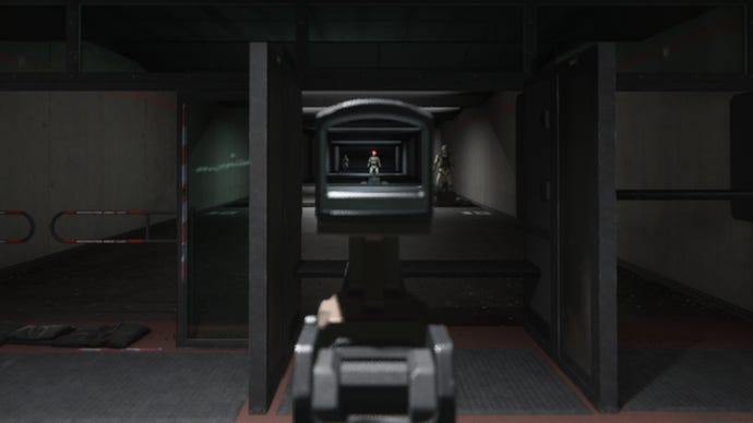 An image showing ADS aiming in Modern Warfare 3’s firing range. We zoom in on a target, giving us a precise shot but slowing movement severely.