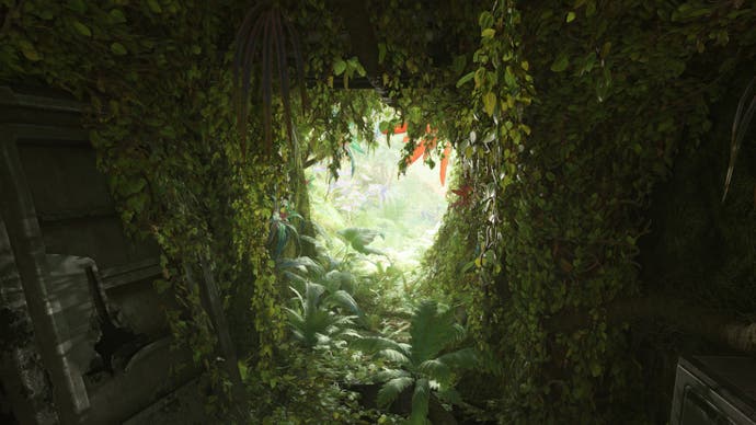 Avatar: Frontiers of Pandora screenshot showing A tunnel opening out into a glorious, lush paradise.