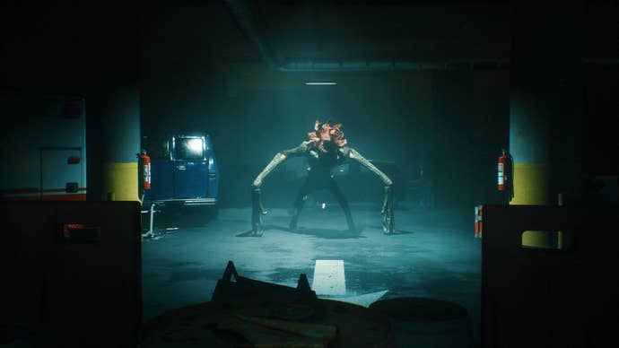 A Quiet Place: The Road Ahead official screenshot showing a monster staring you down in a dark room