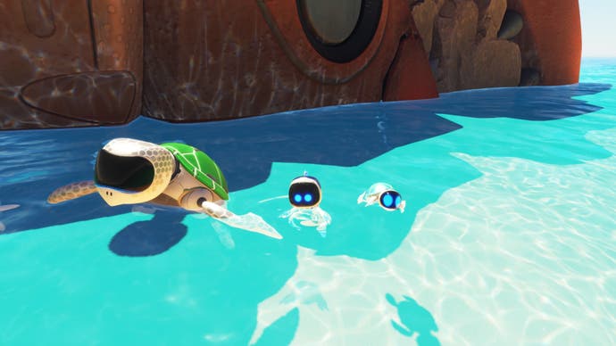 Astro Bot in blue sea water next to an adorable robot turtle