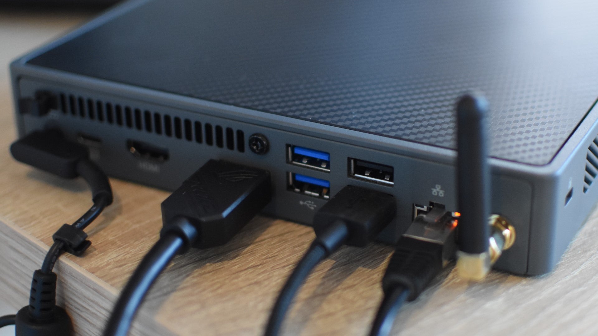 A rear view of the Acer Revo Box, showing the majority of its connection ports. - 4
