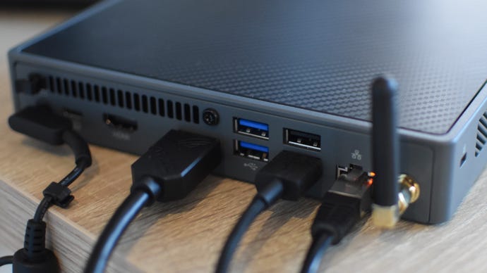 A rear view of the Acer Revo Box, showing the majority of its connection ports.
