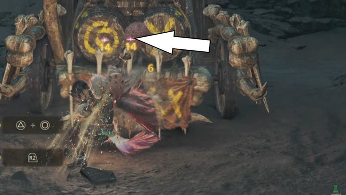 An arrow pointing to pink star symbols under damage numbers in Monster Hunter Wilds.