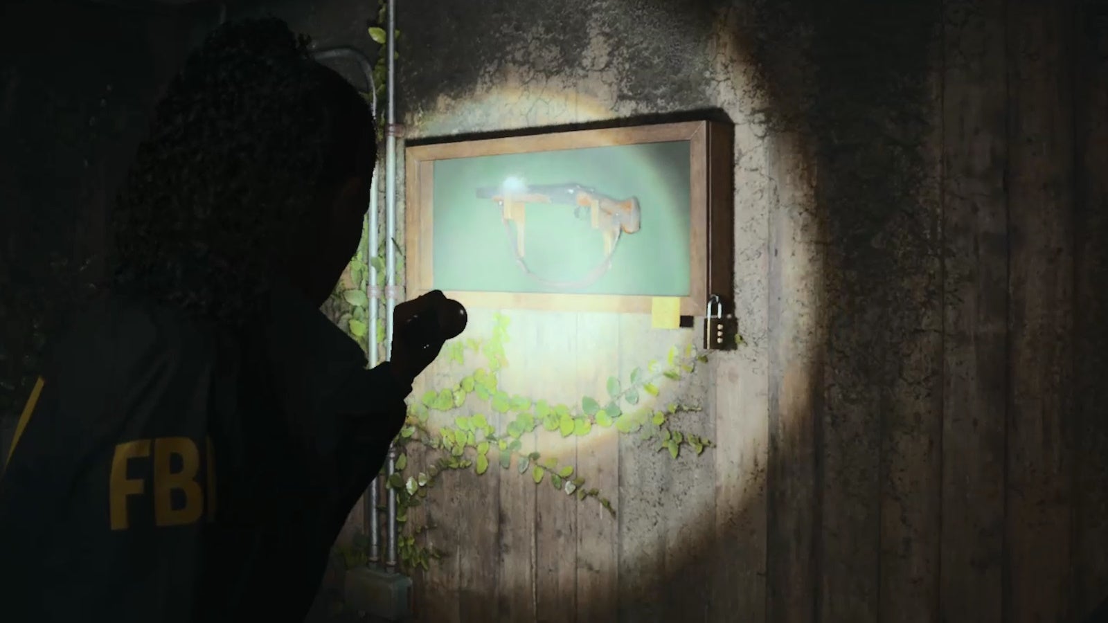 saga shining her flashlight on a mounted display case containing a sawed off shotgun, in a dilapidated room with wooden walls