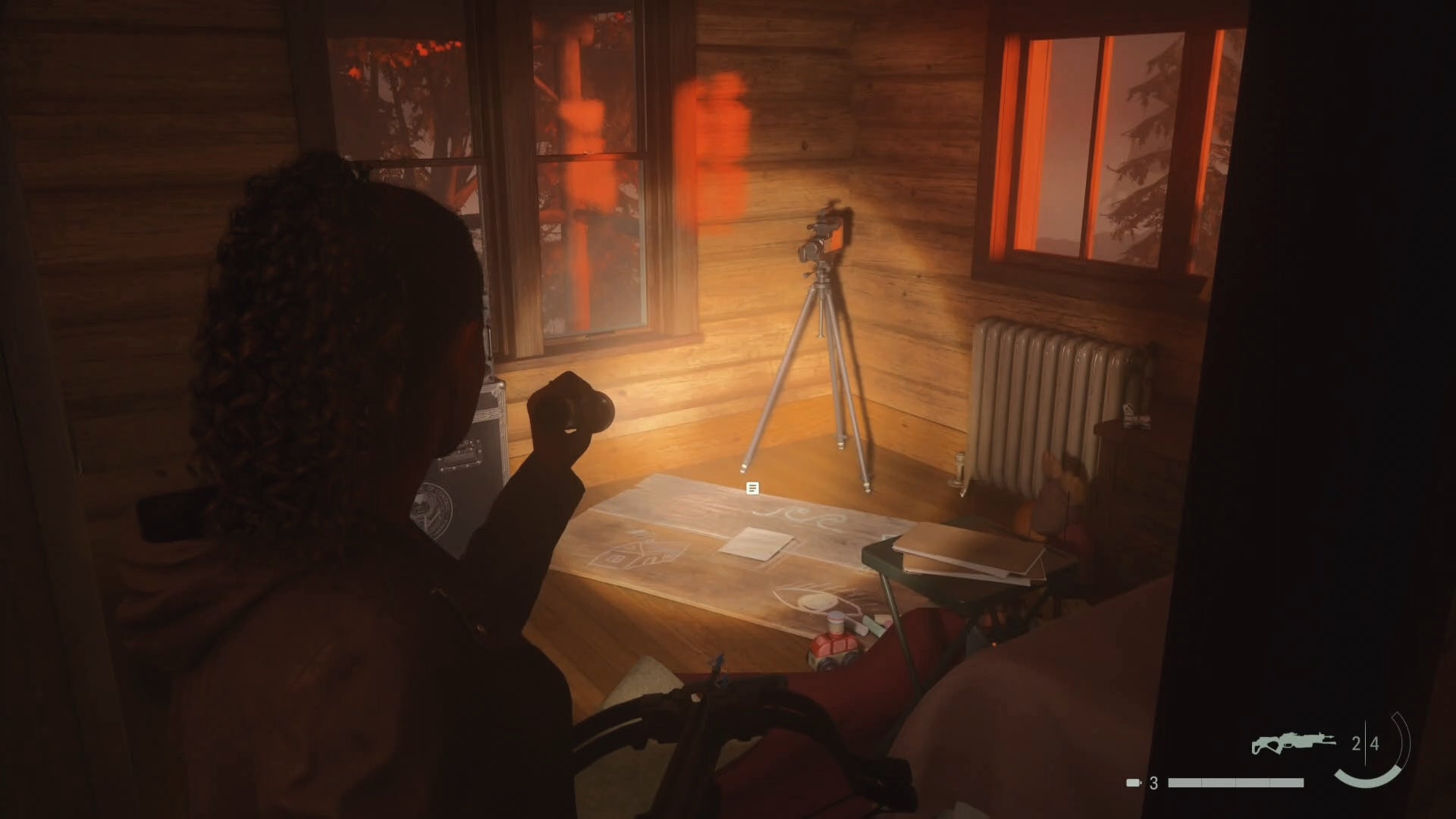 saga shining her flashlight on a nursery rhyme puzzle in a small room inside a cabin