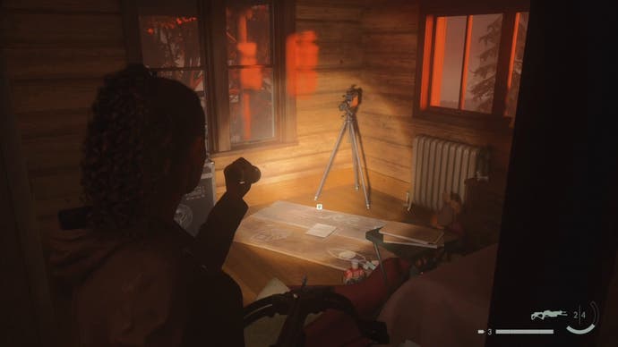 saga shining her flashlight on a nursery rhyme puzzle in a small room inside a cabin