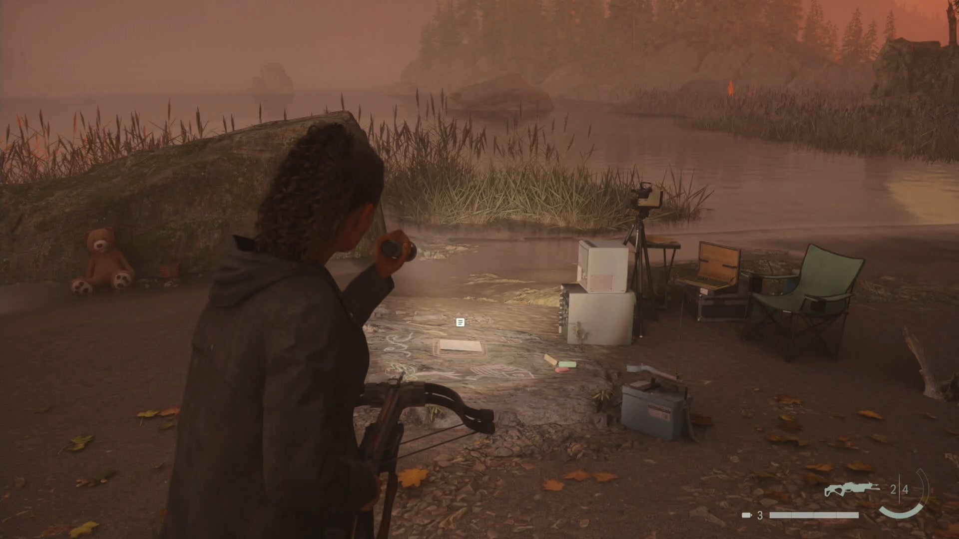 saga shining her flashlight on a nursery rhyme puzzle by the shore