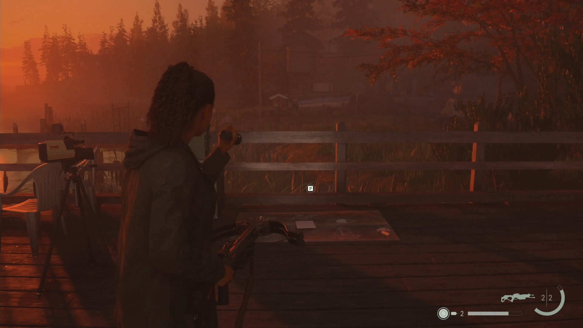 saga shining her flashlight on a nursery rhyme puzzle on a pier overlooking a forest