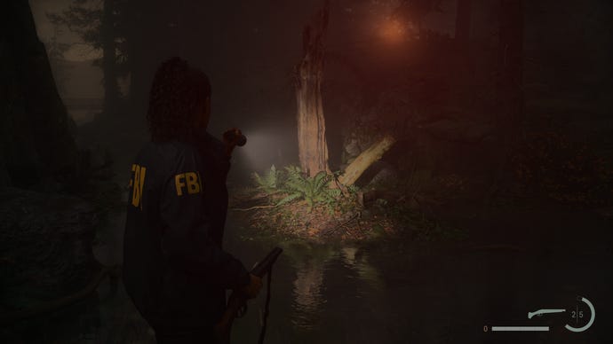 A dark forest scene in Alan Wake 2, with ray tracing on its High preset.