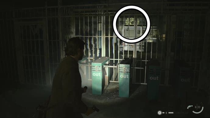 alan shining his flashlight on a word of power on a wall far off behind a subway ticket gate, with the word circled in white