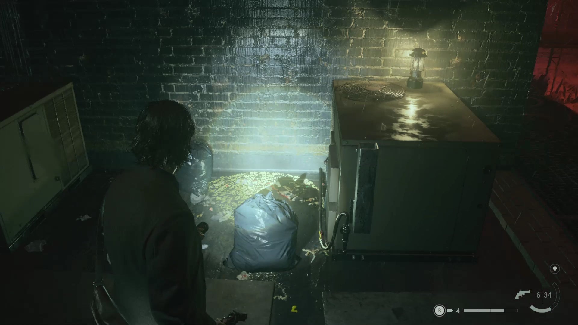 alan shining his flashlight on a word of power beside an air vent on a rooftop