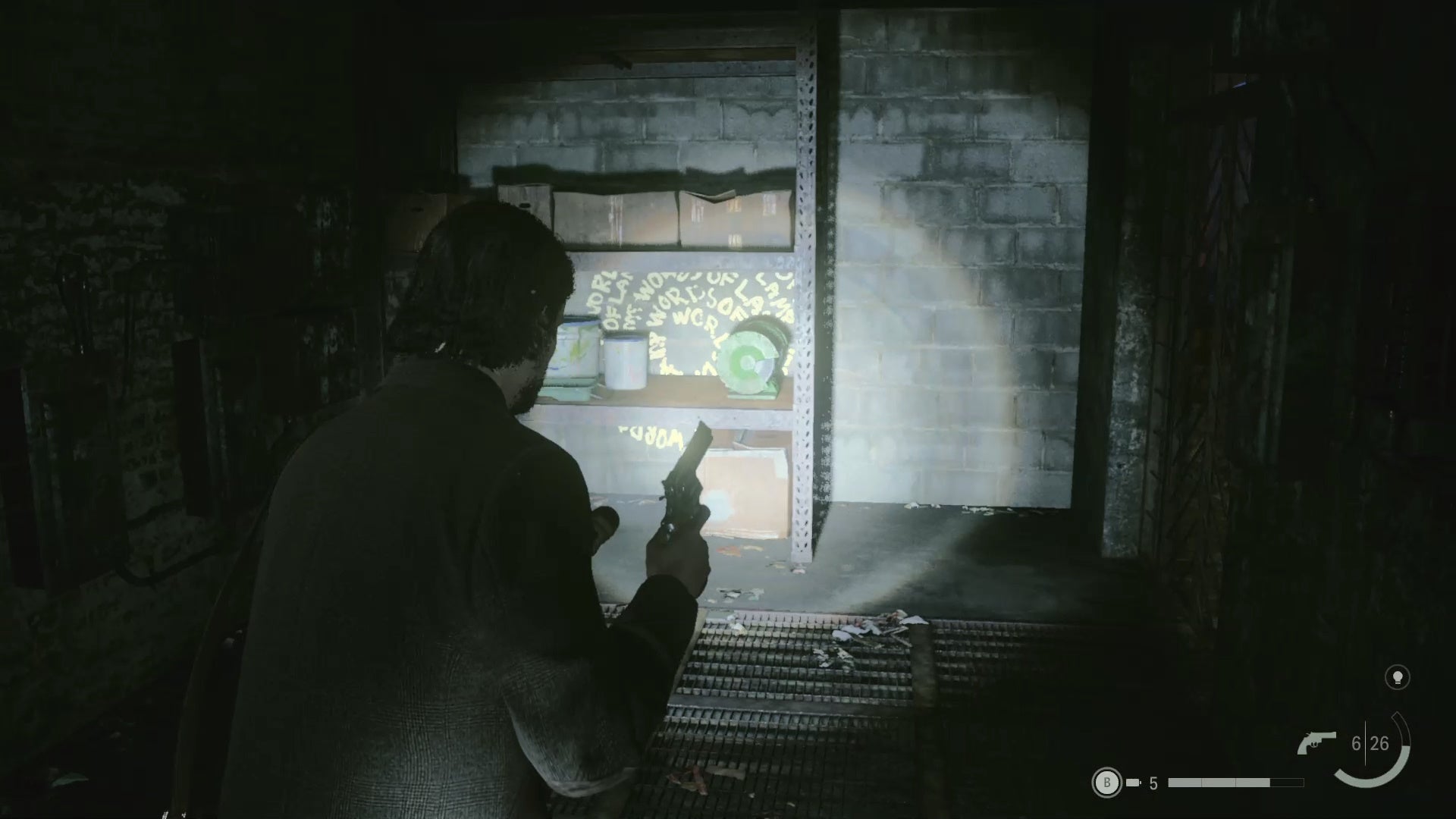 alan shining his flashlight on a word of power on a wall behind a bookcase in a small rundown room in a subway station