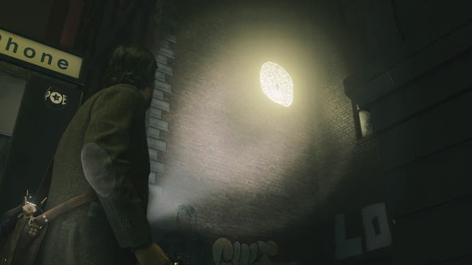 alan wake shining his flashlight on a yellow drawing on a brown wall in a street resembling new york, while standing next to a phone box