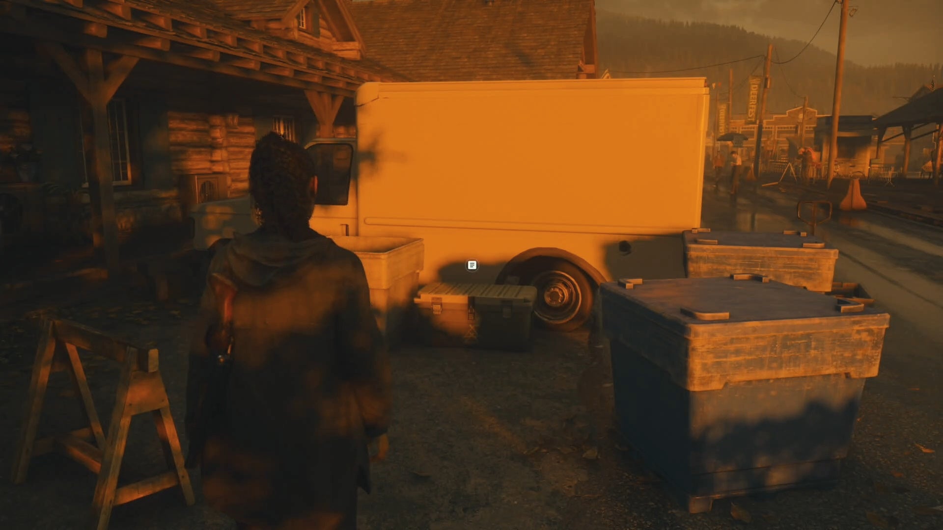 saga shining her flashlight on a cult stash beside a van in a bright falls street