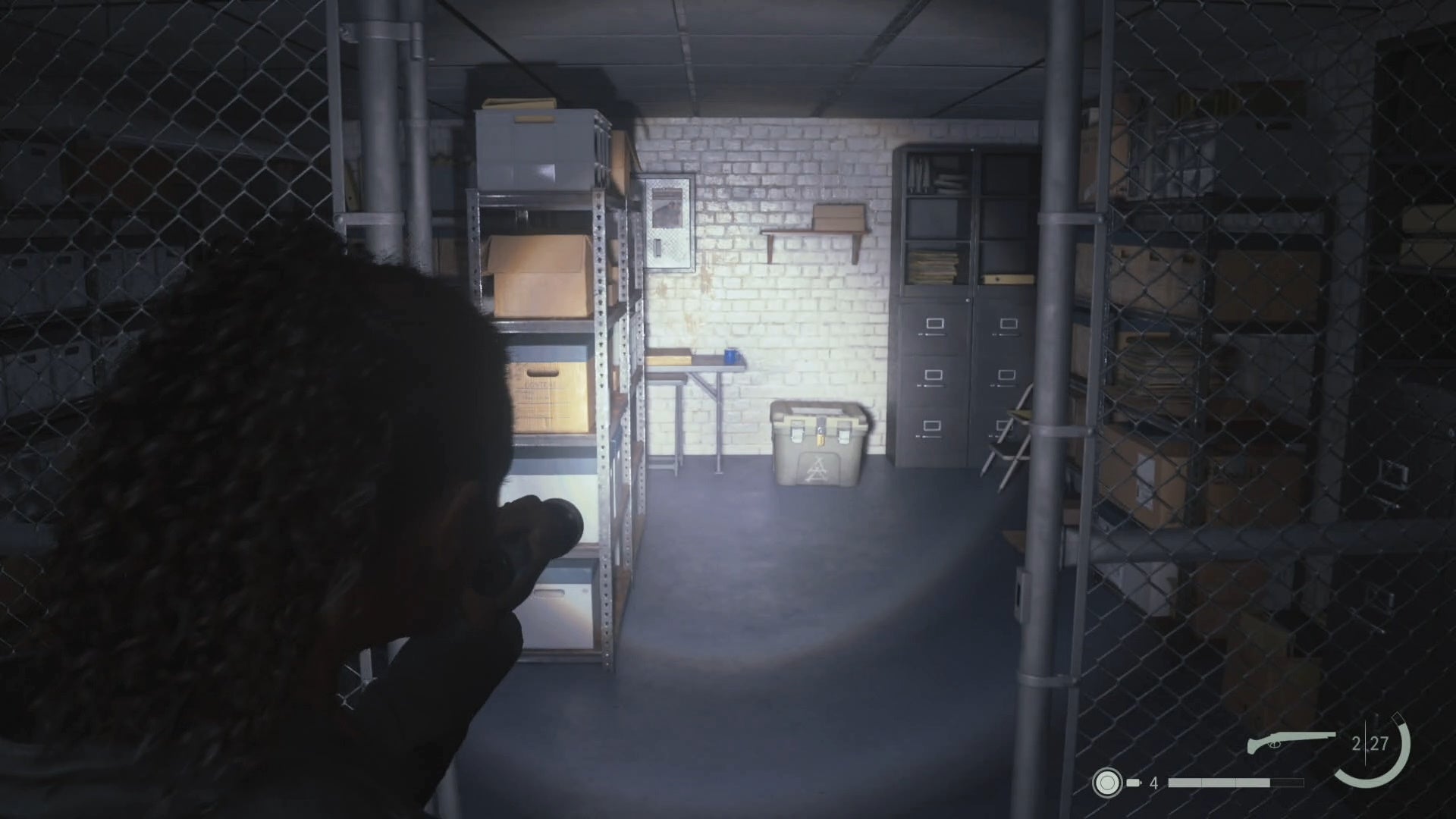 saga shining her flashlight on a cult stash inside the sheriff&rsquo;s station evidence room