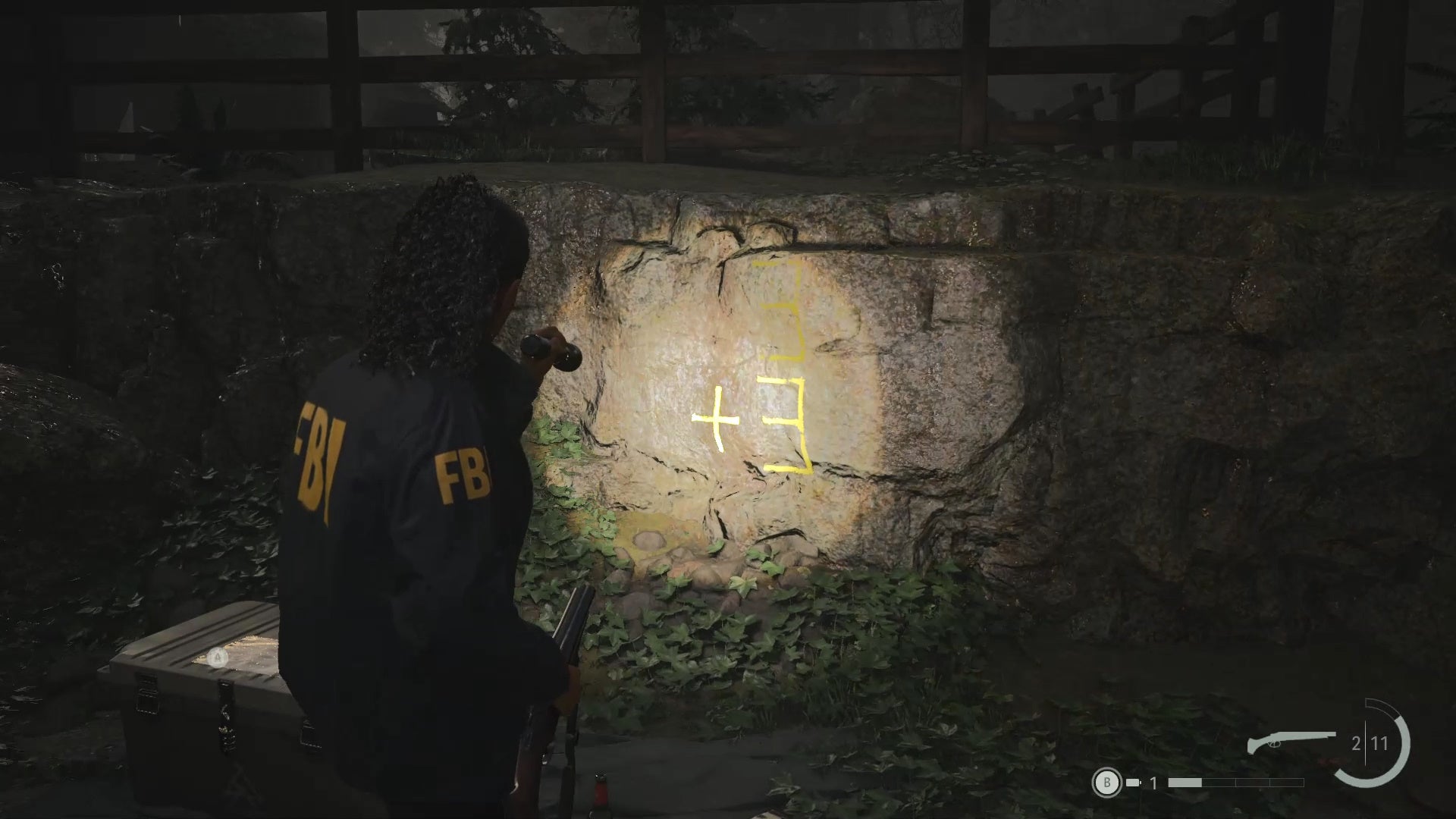 saga shining her flashlight on yellow writing that reads &lsquo;3 + 3&rsquo;