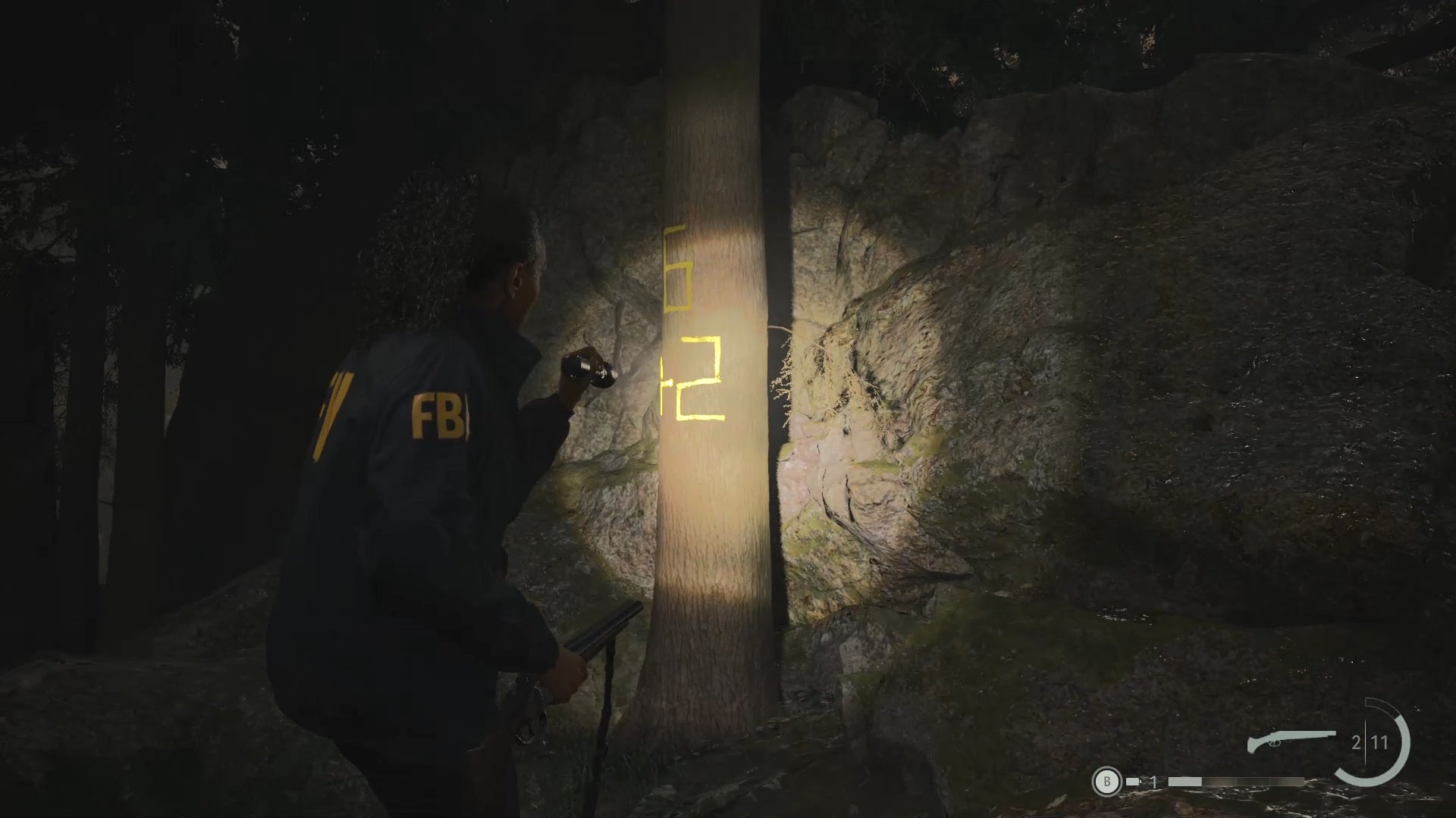 saga shining her flashlight on yellow writing that reads &lsquo;6 + 2&rsquo;