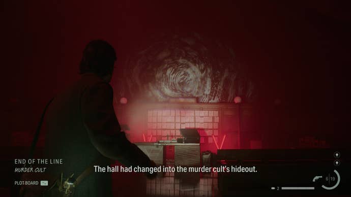 A train station decorated with the lights and symbolism of a cult hideout in Alan Wake 2