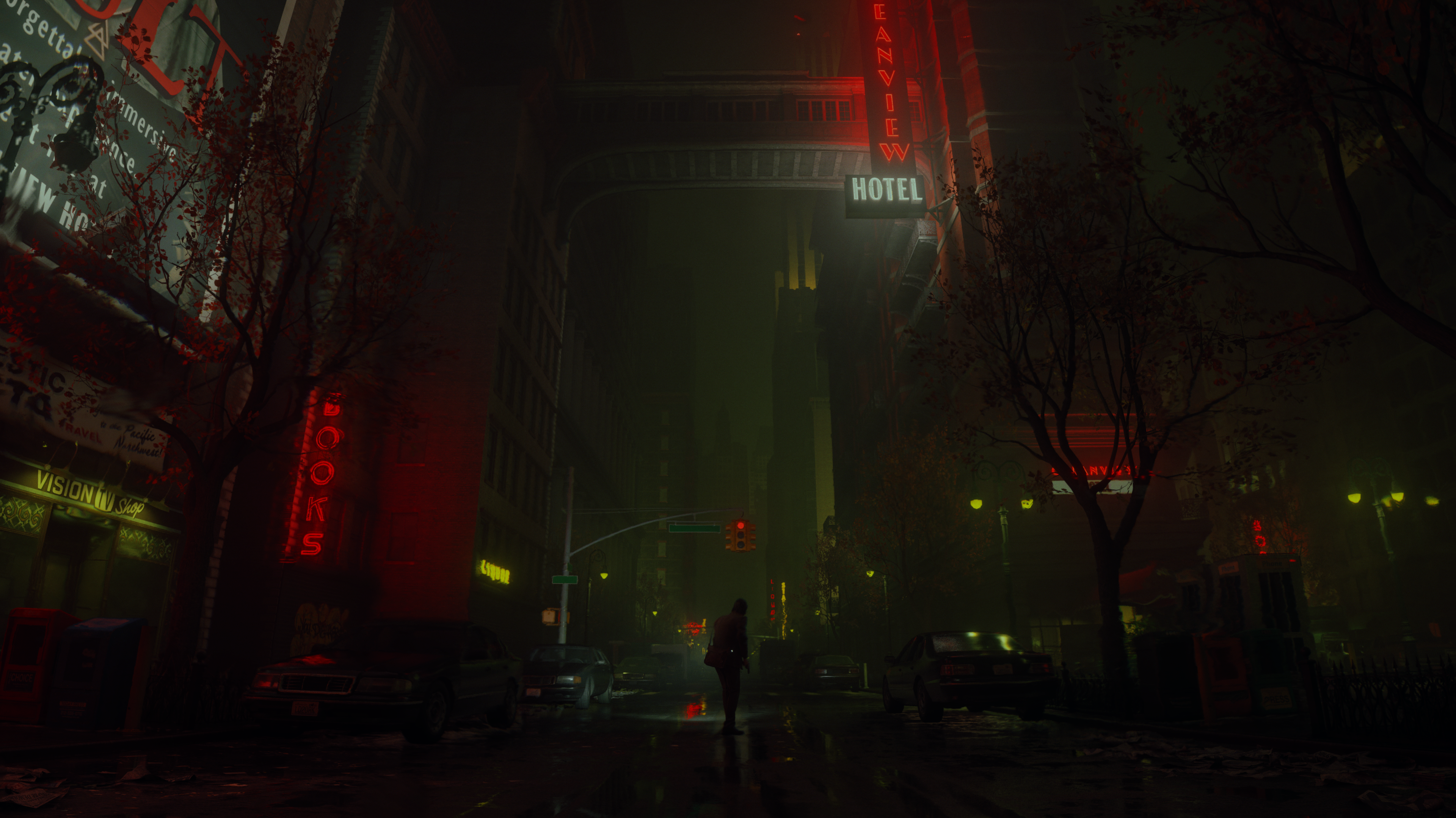 Alan Wake 2 screenshot showing Wake&rsquo;s distant silhouette in a rainy street, at night, through a dark city with red neon lights