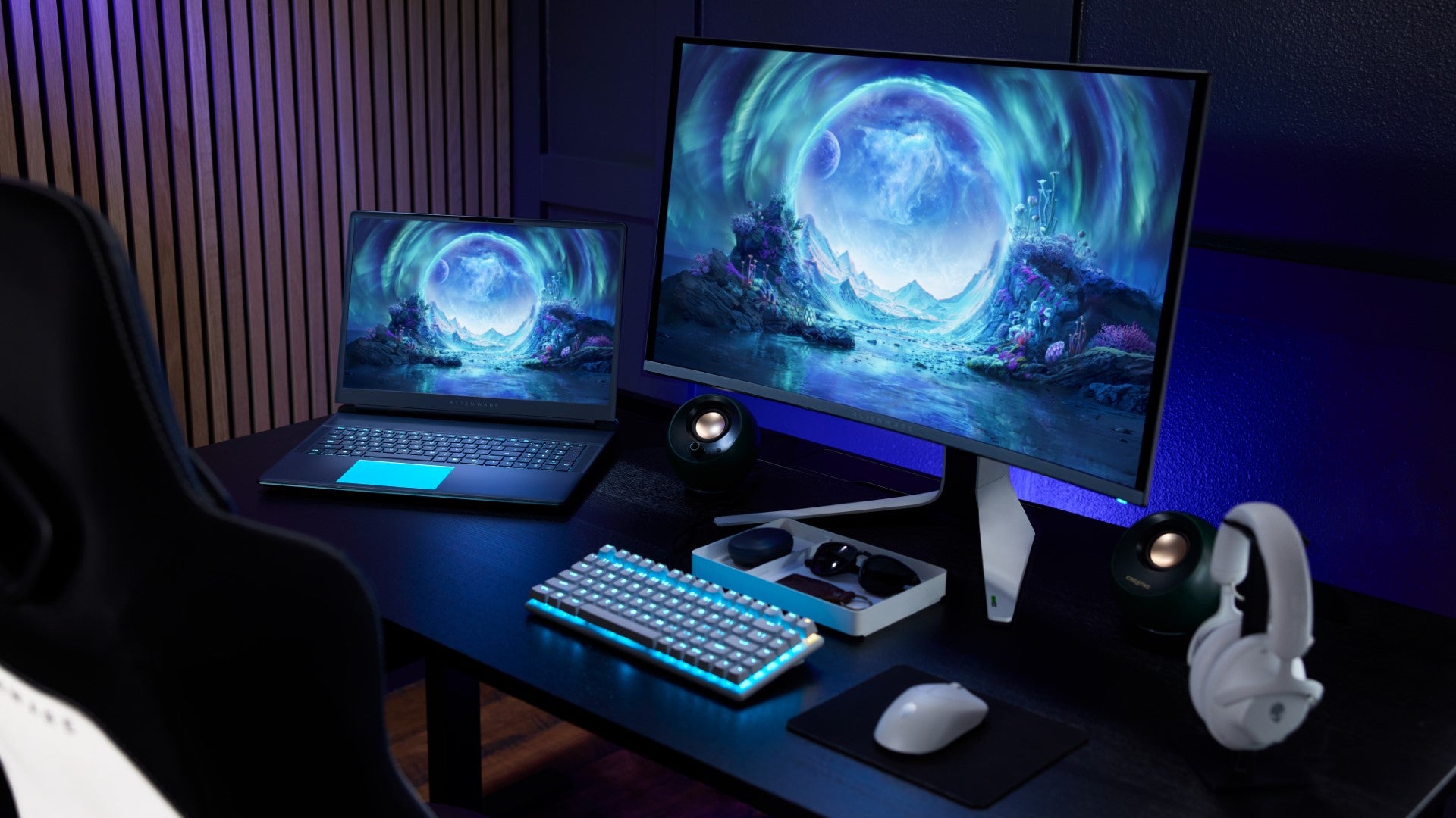An Alienware laptop and monitor on a desk. - 5