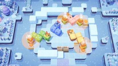 All you need is help screenshot showing blocks with faces lining up on a icy snow covered scene