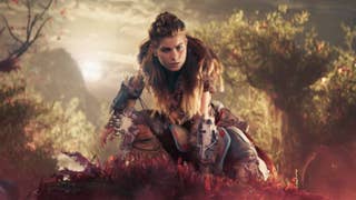 Aloy in Horizon Forbidden West trailer perched atop some red foliage