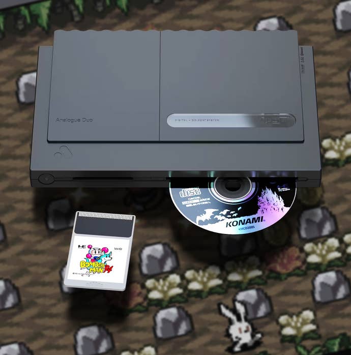 The Analogue Duo, with a disc ejecting from the tray and a Bomberman 94 cart, over a background of Bomberman 94.