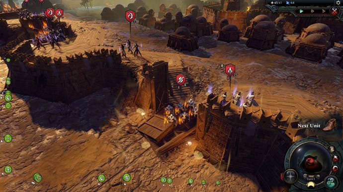 Age of Wonders 4 review - screenshot showing a zoomed-in view of a siege, with orange desert walls and a lowered drawbridge gate